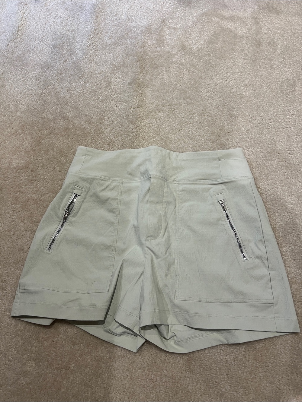 Athleta Light Sage Green Athletic Shorts with Silver Zippers